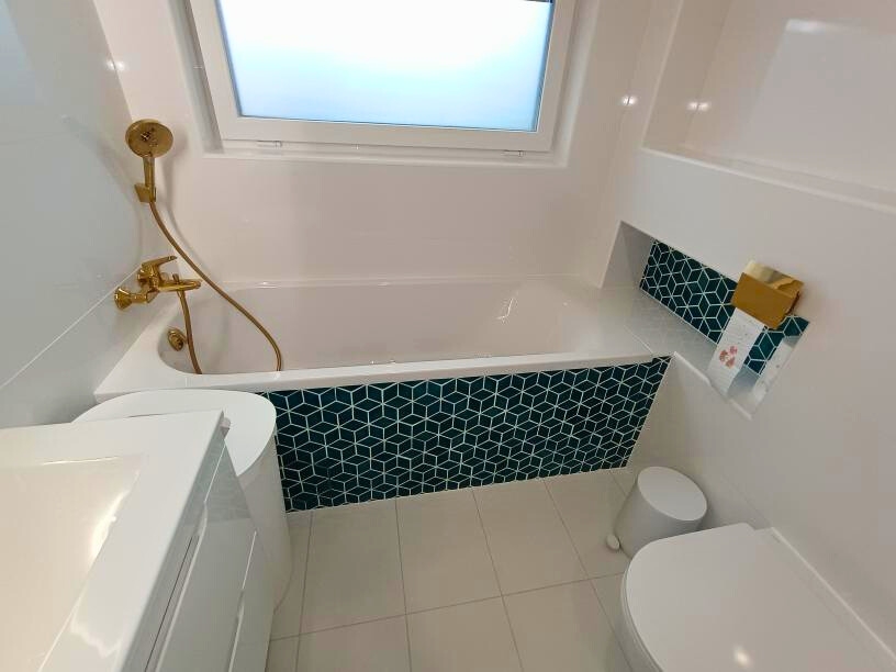 Ceramic mosaic tiles - diamonds, petrol blue color, tiled bathtub