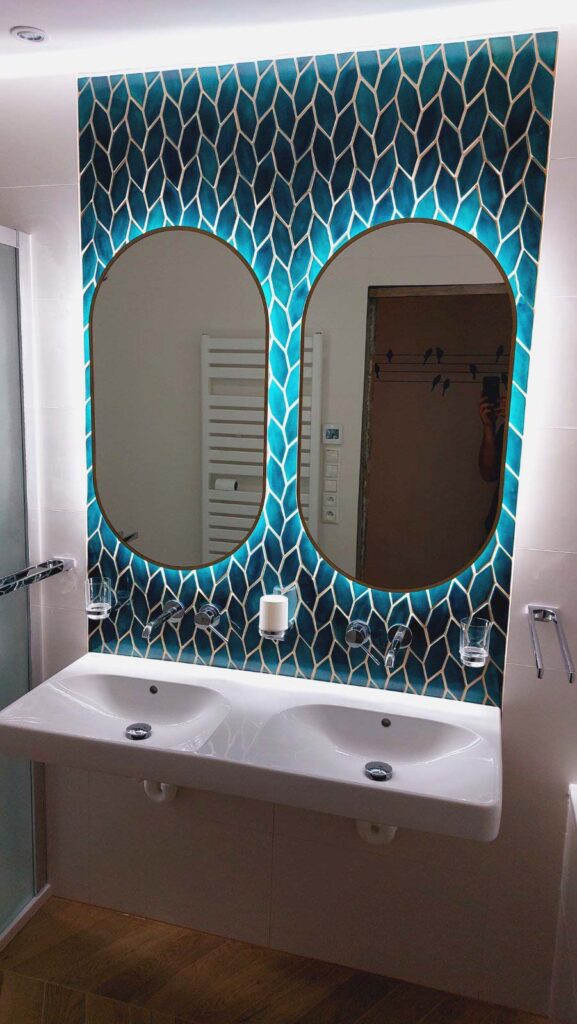 Ceramic mosaic tiles - longed hexagons, petrol blue color, bathroom wall behind the mirror